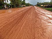 Slippery Dirt Road in Cambodia in the Rainy Season by Asienreisender